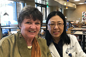Joe's mother, Mary Ann Laubaucher with brain tumor specialist Dr. Xiao Tang Kong